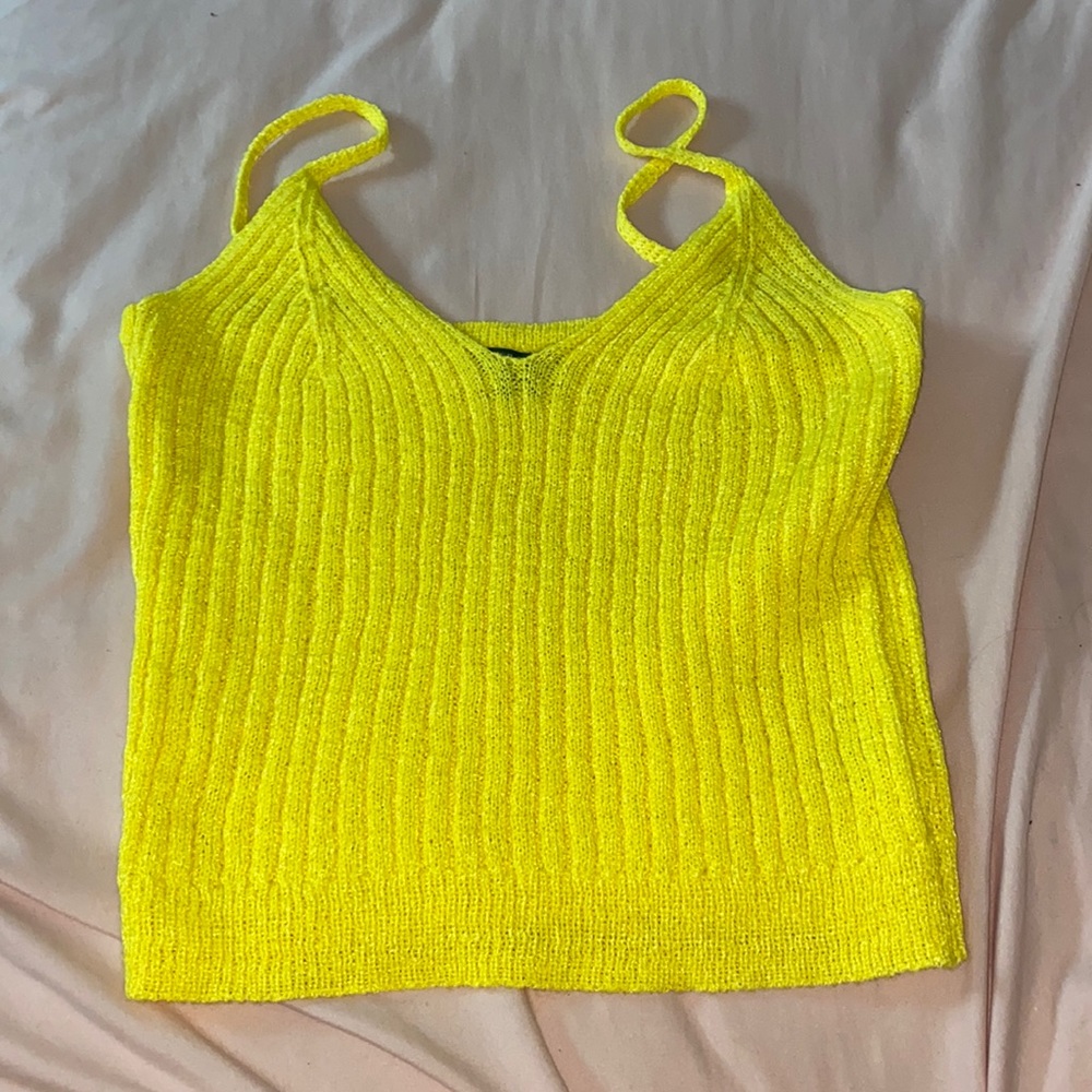 Yellow knitted tank top.